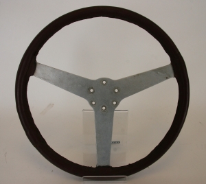 A period leather-rimmed steering wheel